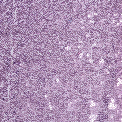 Purple sequin fabric texture with a shimmering finish.