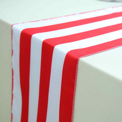Red and white striped table runner on a neutral table surface.