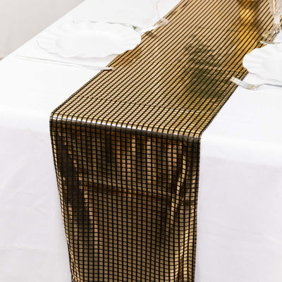 Gold sequin table runner on a white tablecloth