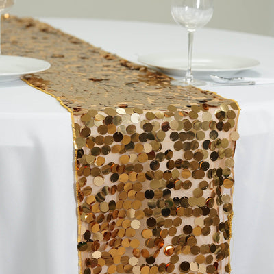 Gold sequin table runner on a white table, perfect for parties and events.