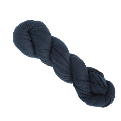 Navy blue soft fabric yarn skein on white background