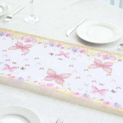 Butterfly-patterned table runner on a dining table setting.