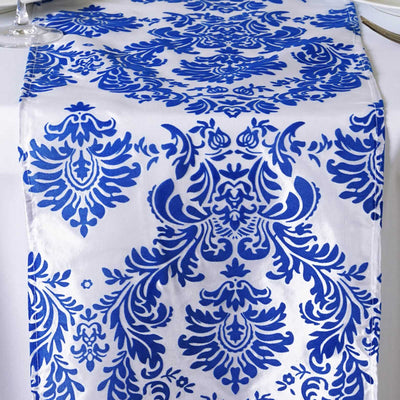 Blue and white patterned table runner on a plain background.