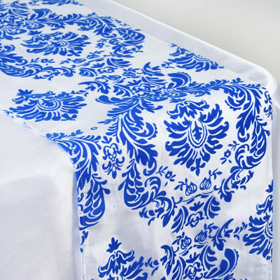 Blue and white patterned table runner on a plain background.