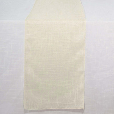 Cream-colored linen table runner on a plain background