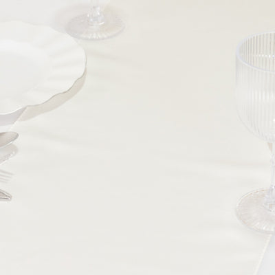 Elegant table setting with white plate and glassware