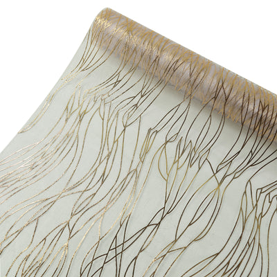 Sheer fabric roll with gold and brown abstract floral design.