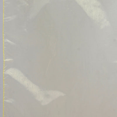 Sheer fabric with yellow stitching on a plain background.