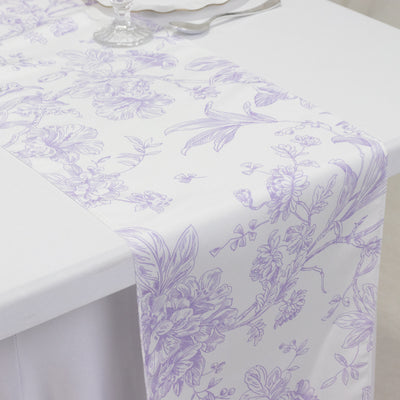 Lavender floral table runner on a white table setting.