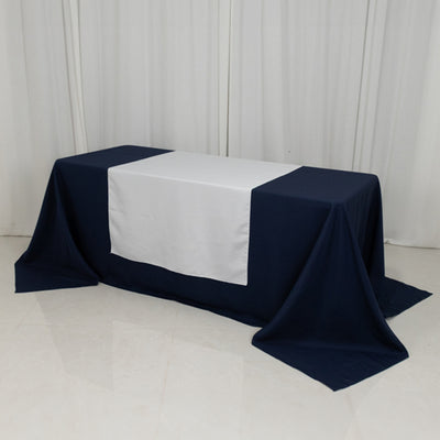 Navy and white tablecloth draped elegantly over a table