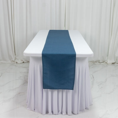 Blue table runner on a white tablecloth.