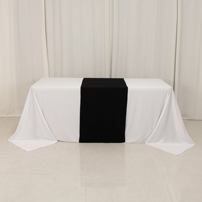 Table with black and white tablecloth for events or decor