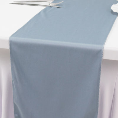Gray table runner on a white table setting