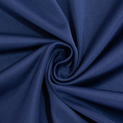 Navy blue fabric texture in a swirling pattern.