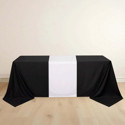 Black and white tablecloth draped over a table.