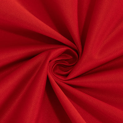Red fabric swirl texture close-up shot.