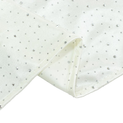 White fabric with silver sequin embellishments