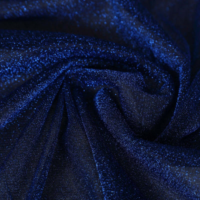 Shimmering blue glitter fabric texture close-up shot.