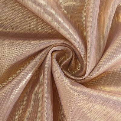 Shimmering golden fabric with a textured finish, ideal for fashion and decor.