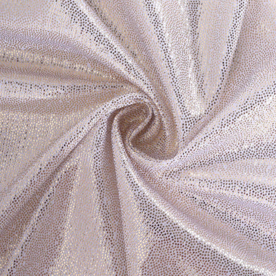 Shimmering pink stretch fabric with a textured surface for fashion designs.