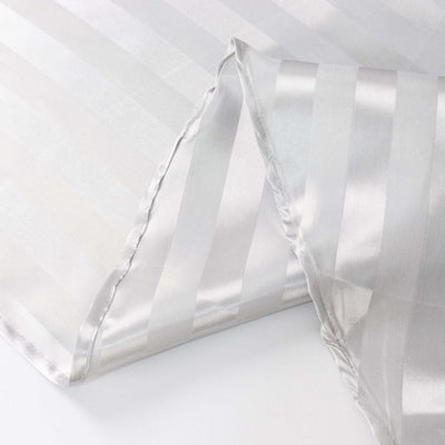 Silky silver striped fabric with a smooth finish