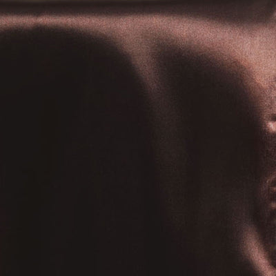 Abstract texture in shades of brown and black.