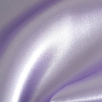 Soft lavender satin fabric draped elegantly.