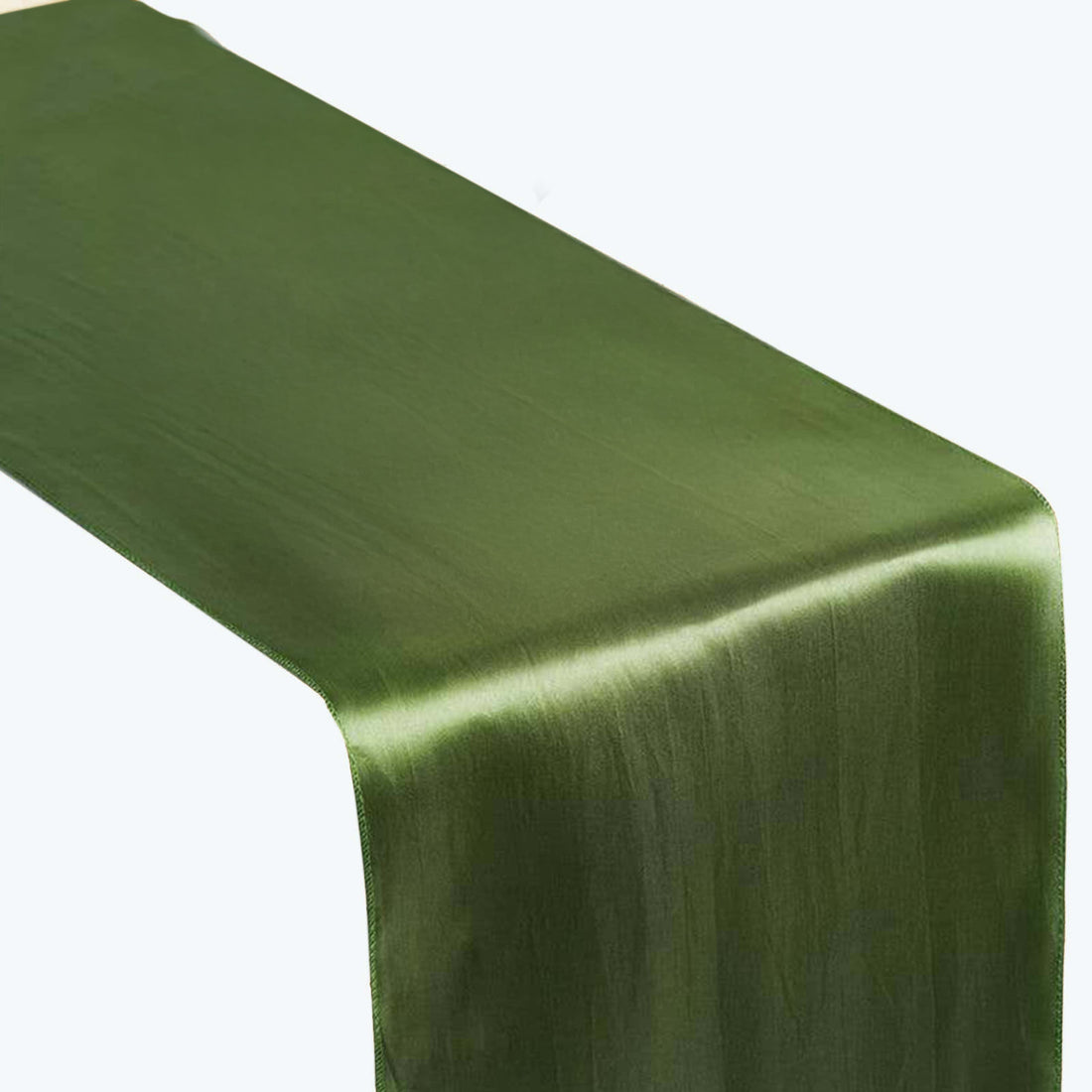 Green satin table runner on a plain background
