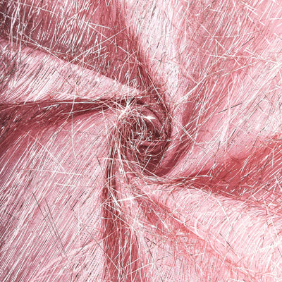 Shimmering pink fabric with metallic threads in a swirling pattern.
