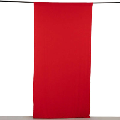 Red fabric backdrop on display for photography or events