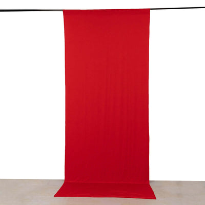 Red fabric backdrop for photography or staging purposes