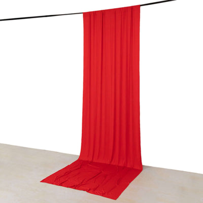 Red fabric backdrop draped elegantly for photography or events
