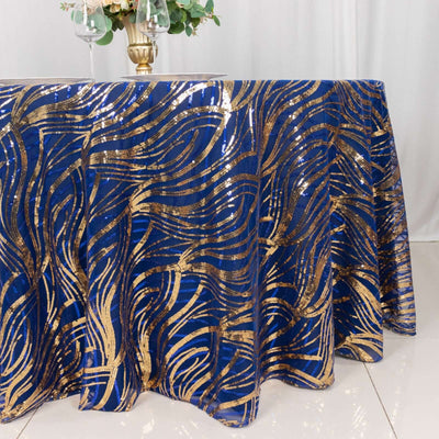 Blue and gold patterned tablecloth draped over a table.
