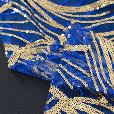 Blue and gold sequin fabric with intricate patterns.