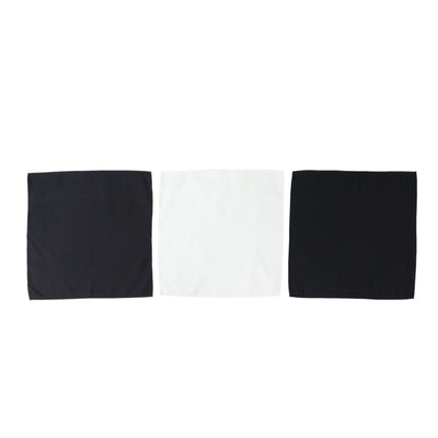 Set of three fabric swatches: black, white, and gray.
