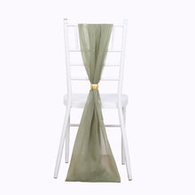 Stylish eucalyptus sage green chiffon chair sashes on a white chair