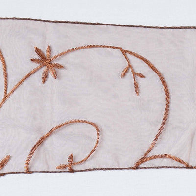 Embroidered sheer fabric with floral design in copper tones