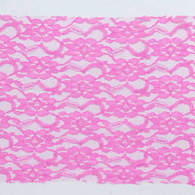 Pink floral lace fabric with intricate details.