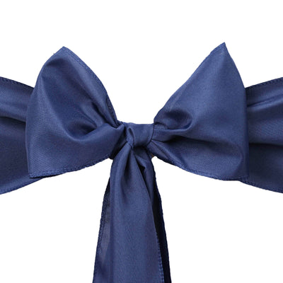 Navy blue satin ribbon bow on a white background