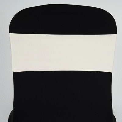 Black chair cover with white stripe, studio shot.