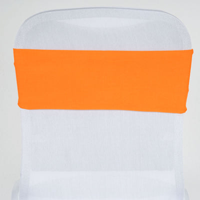 Orange chair cover on a transparent chair against a white backdrop.