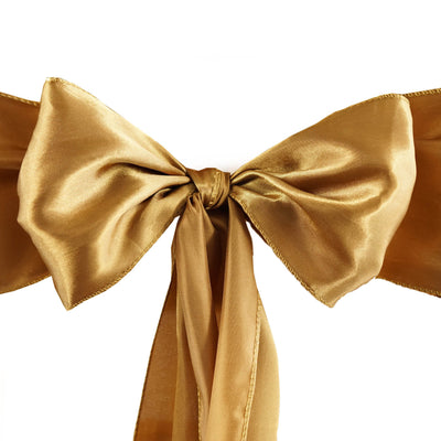 Gold satin bow for decorative purposes
