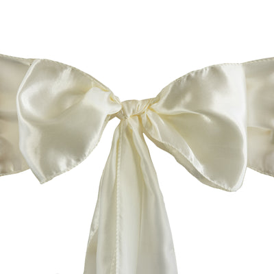 Elegant ivory satin ribbon bow, perfect for gifts and decorations.