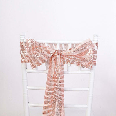 Rose gold lace chair sash draped elegantly on a white chiavari chair.