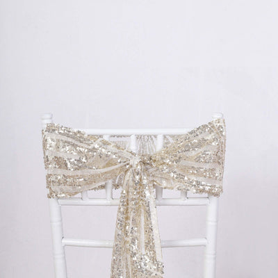 Gold sequin chair sash tied elegantly on a white chiavari chair
