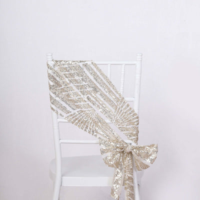 Gold sequin chair sash draped elegantly over a white chair
