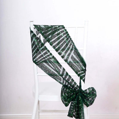 Green sequined ribbon draped elegantly on a white chair.