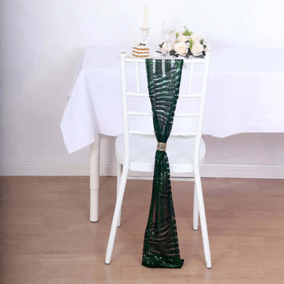Green sequin chair decor with floral arrangement on a dining table.