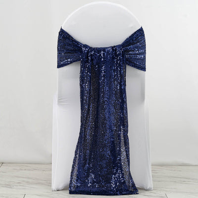 Navy sequin chair sash draped on a white chair