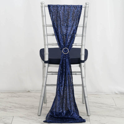 Navy blue sequin chair sash draped elegantly on a silver chiavari chair.